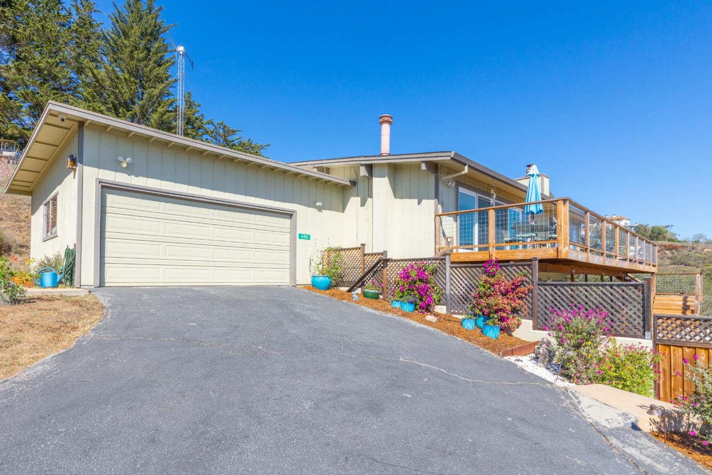490 Amigo Road Soquel, CA 95073 - Photo 35 of 71 a front view of a house with a road