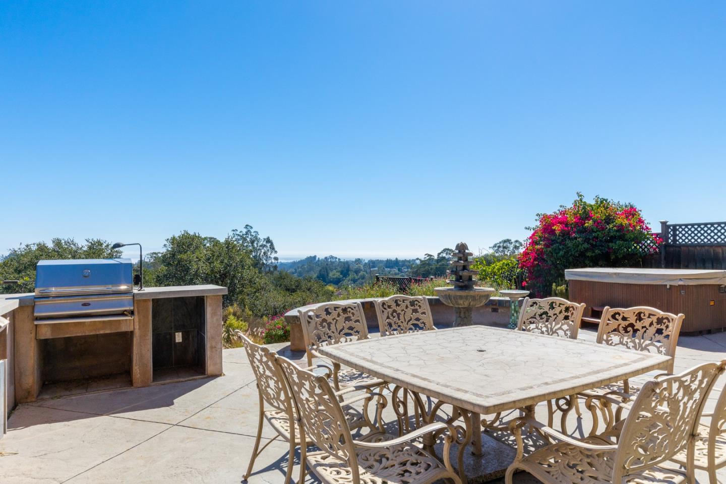 490 Amigo Road Soquel, CA 95073 - Photo 39 of 71 a view of a dinning table and chairs in the patio