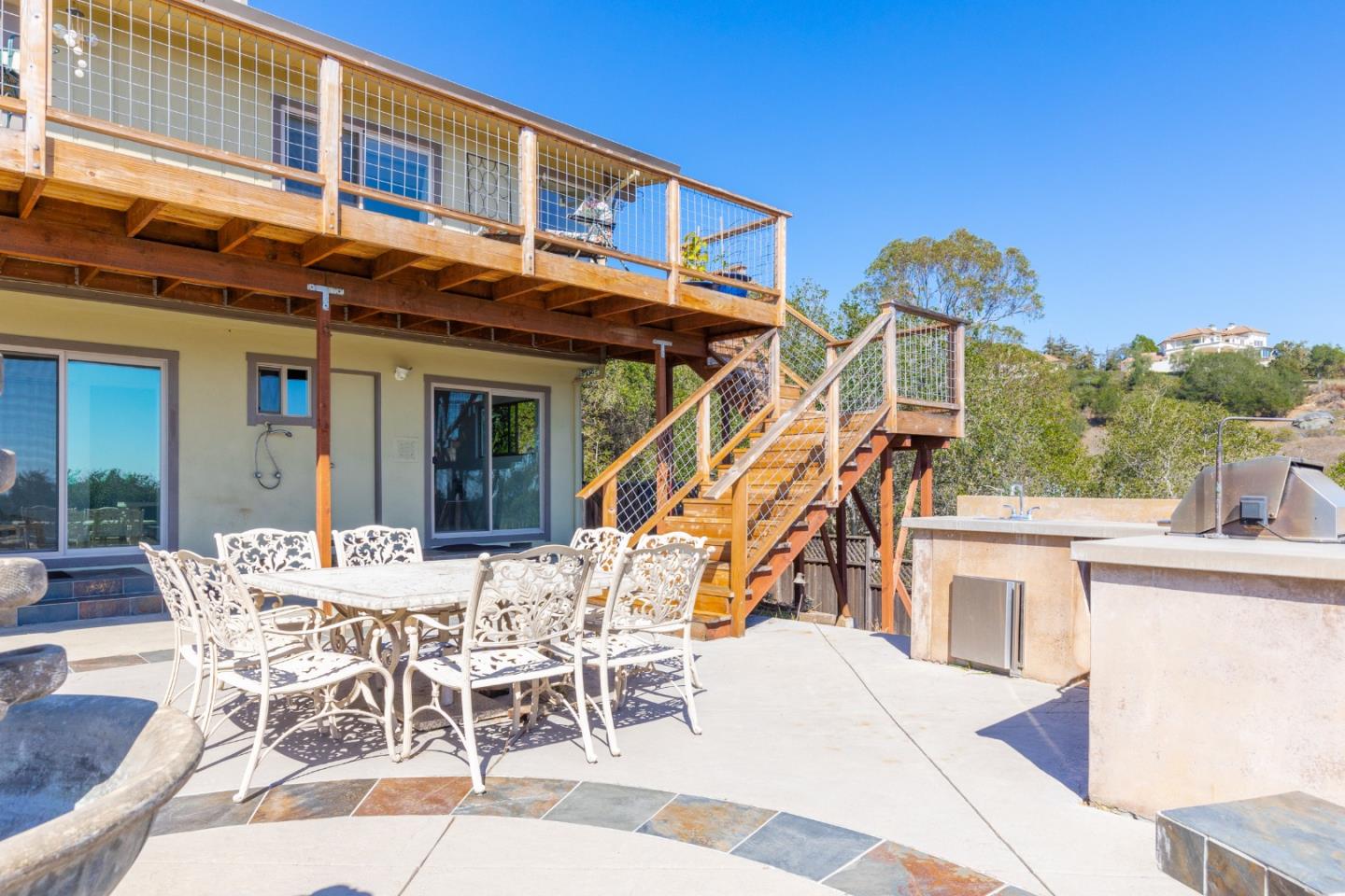490 Amigo Road Soquel, CA 95073 - Photo 43 of 71 a view of a patio with table and chairs