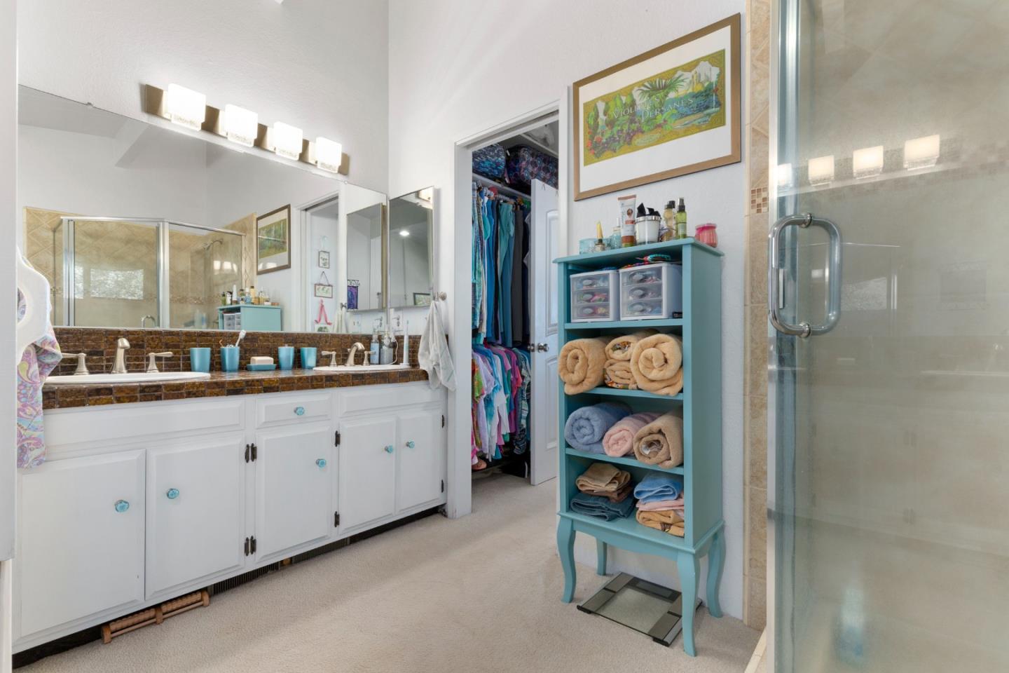 490 Amigo Road Soquel, CA 95073 - Photo 49 of 71 a spacious en suite bathroom with double vanity and mirrors