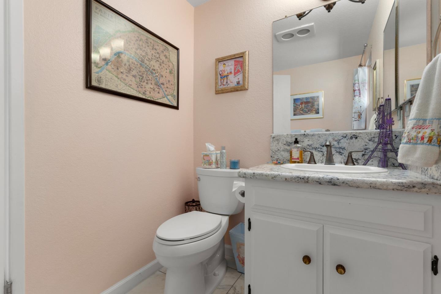 490 Amigo Road Soquel, CA 95073 - Photo 51 of 71 a bathroom with a toilet sink and mirror