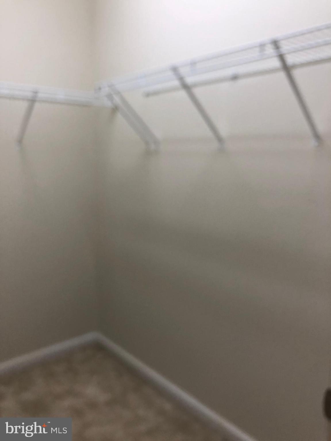 42797 Burrell Square Ashburn, VA 20147 - Photo 8 of 13 a small space with a fan