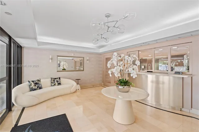 a dining room with furniture window and wooden floor