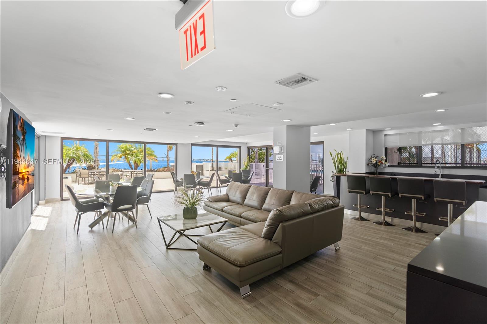 200 Southeast 15th Road, Unit 5D Miami, FL 33129 - Photo 24 of 25 a living room with furniture and a table