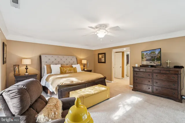 a bathroom with a tub sink a mirror and a shower