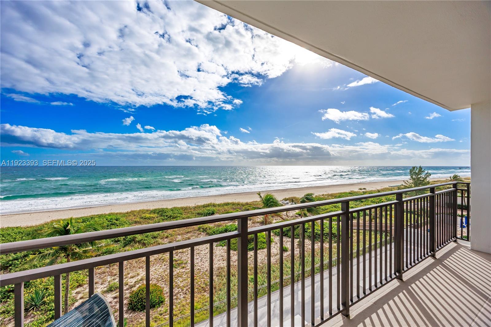 1800 South Ocean Boulevard, Unit 5C Boca Raton, FL 33432 - Photo 37 of 98 a view of a balcony with an ocean beach
