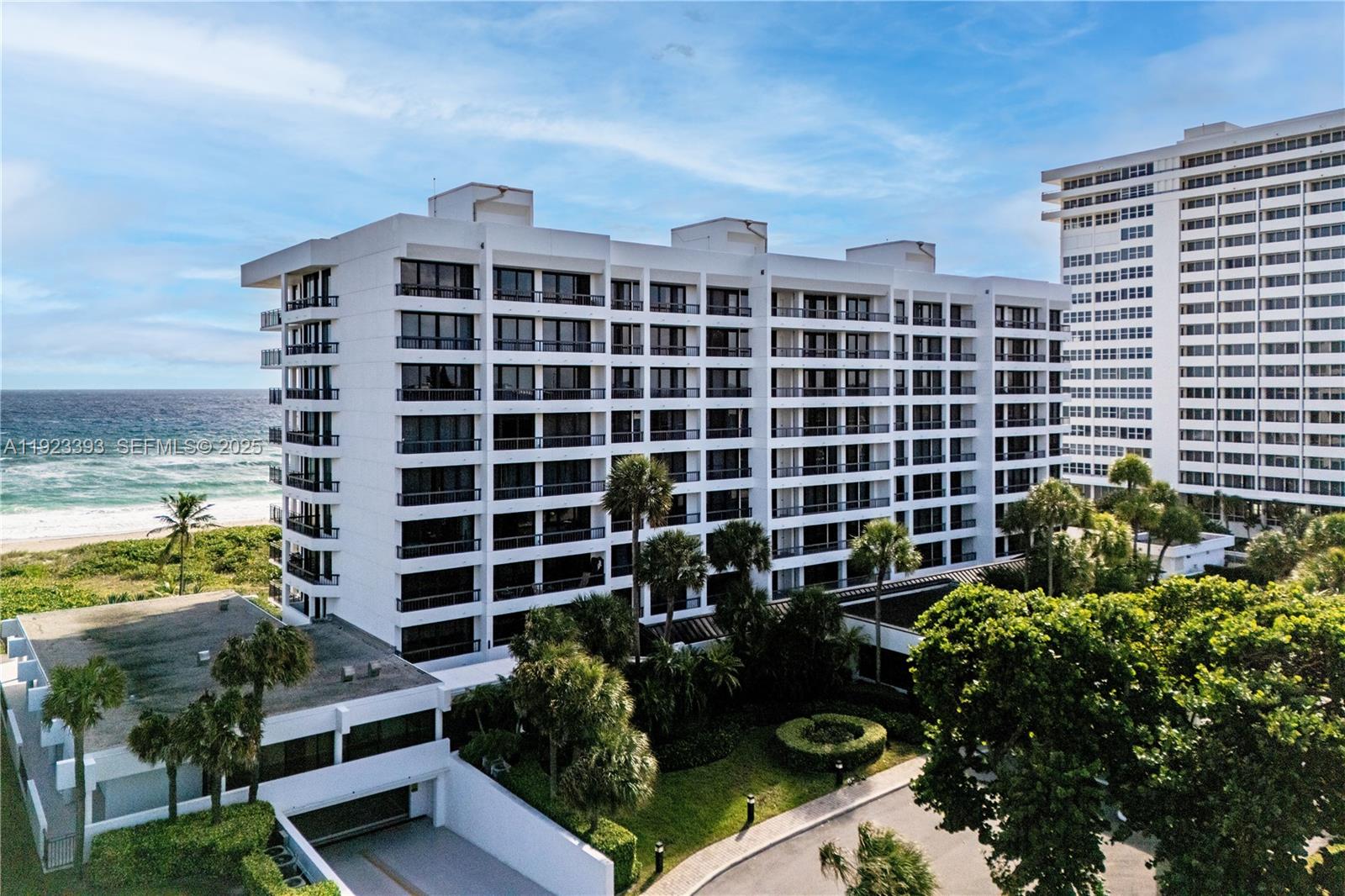 1800 South Ocean Boulevard, Unit 5C Boca Raton, FL 33432 - Photo 50 of 98 a front view of a building with outdoor seating