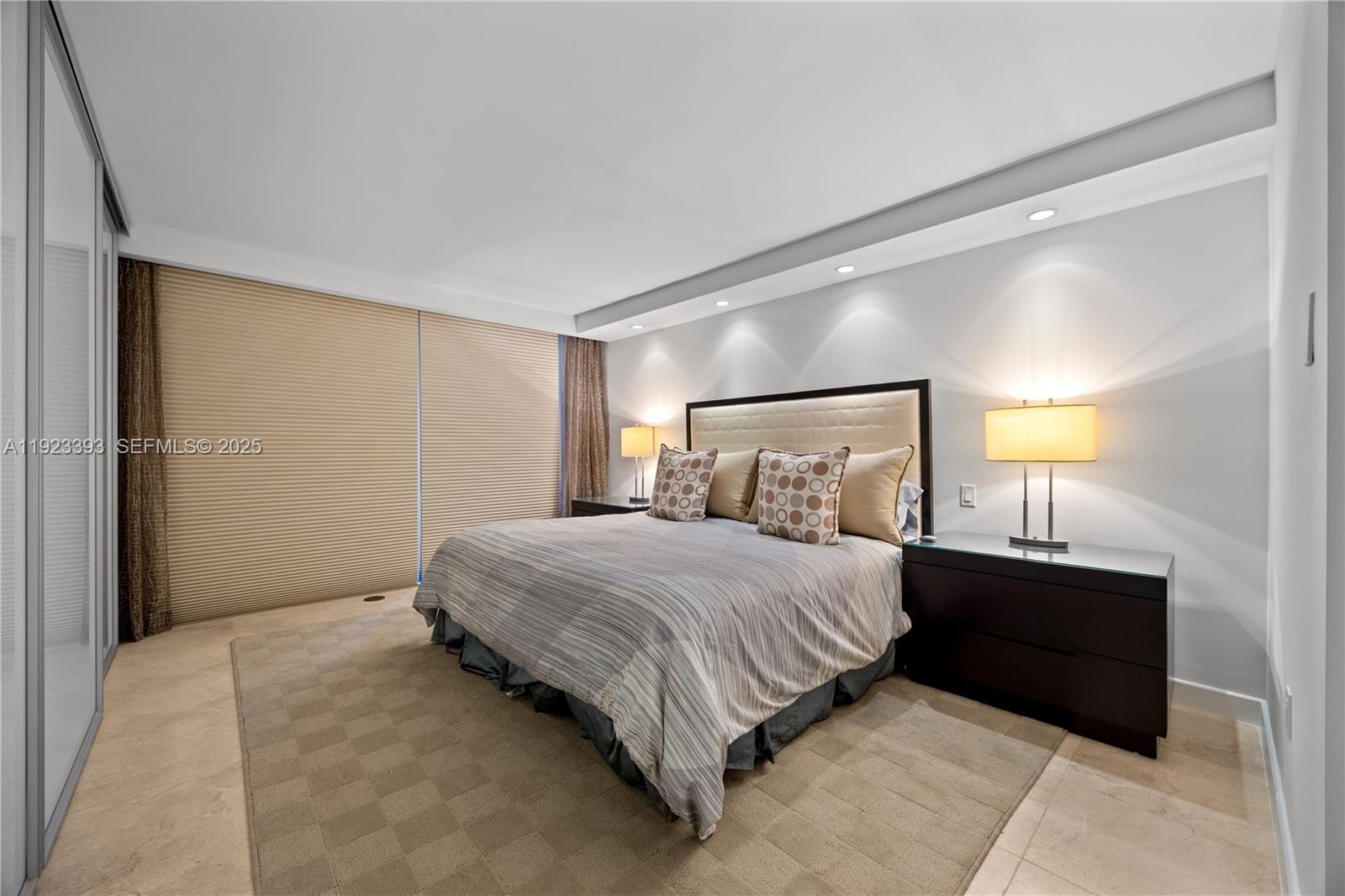 1800 South Ocean Boulevard, Unit 5C Boca Raton, FL 33432 - Photo 84 of 98 a bedroom with a bed and a closet