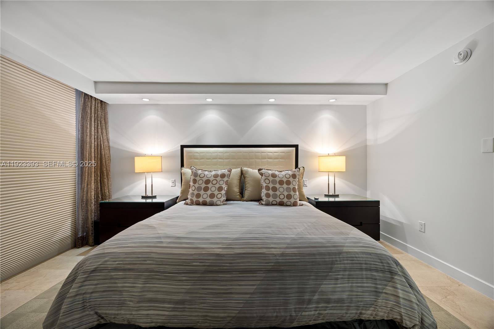 1800 South Ocean Boulevard, Unit 5C Boca Raton, FL 33432 - Photo 88 of 98 a bedroom with a bed and window