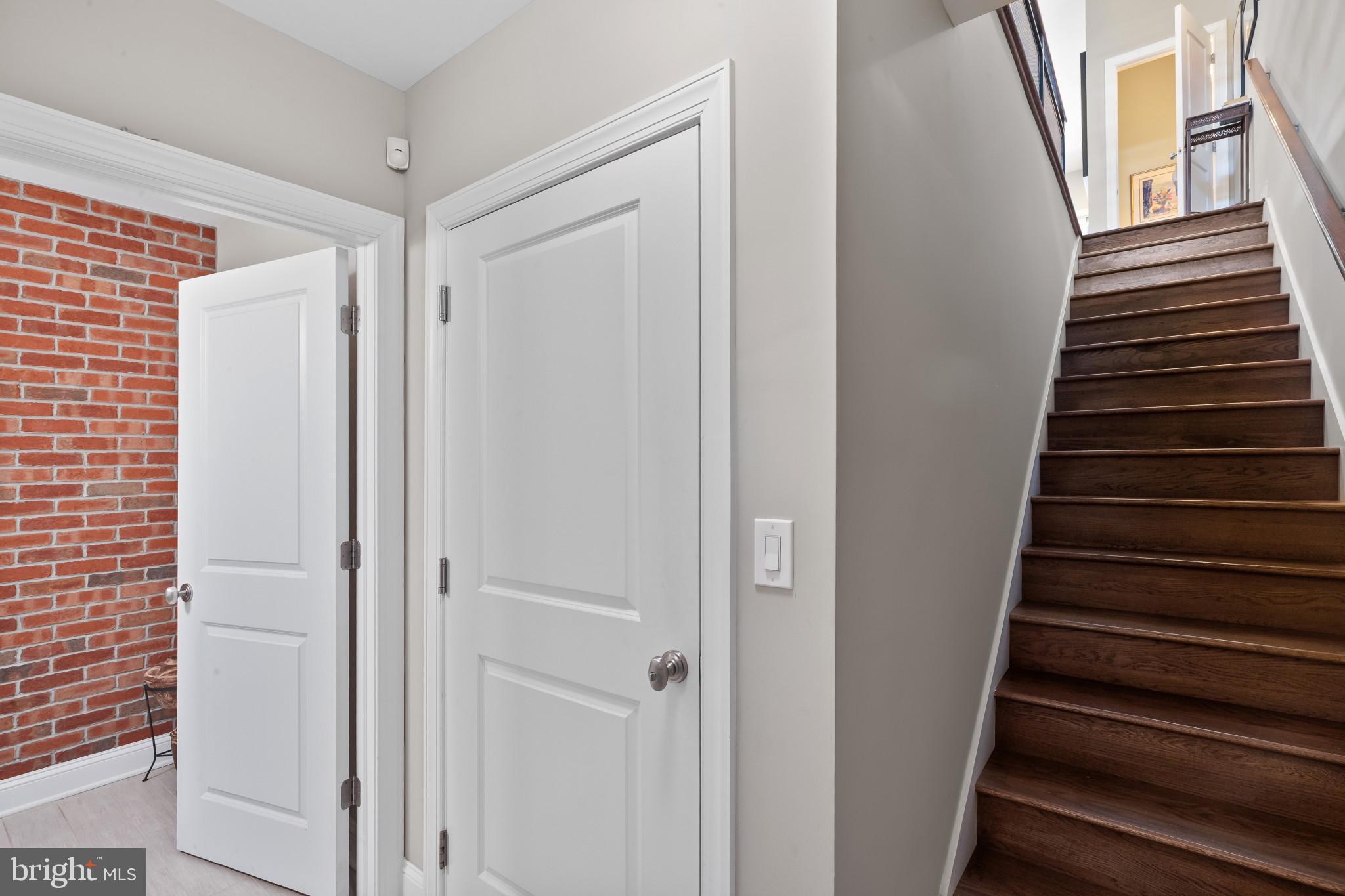 3800 Dillon Street Baltimore, MD 21224 - Photo 24 of 34 a view of a hallway with wooden floor and entryway