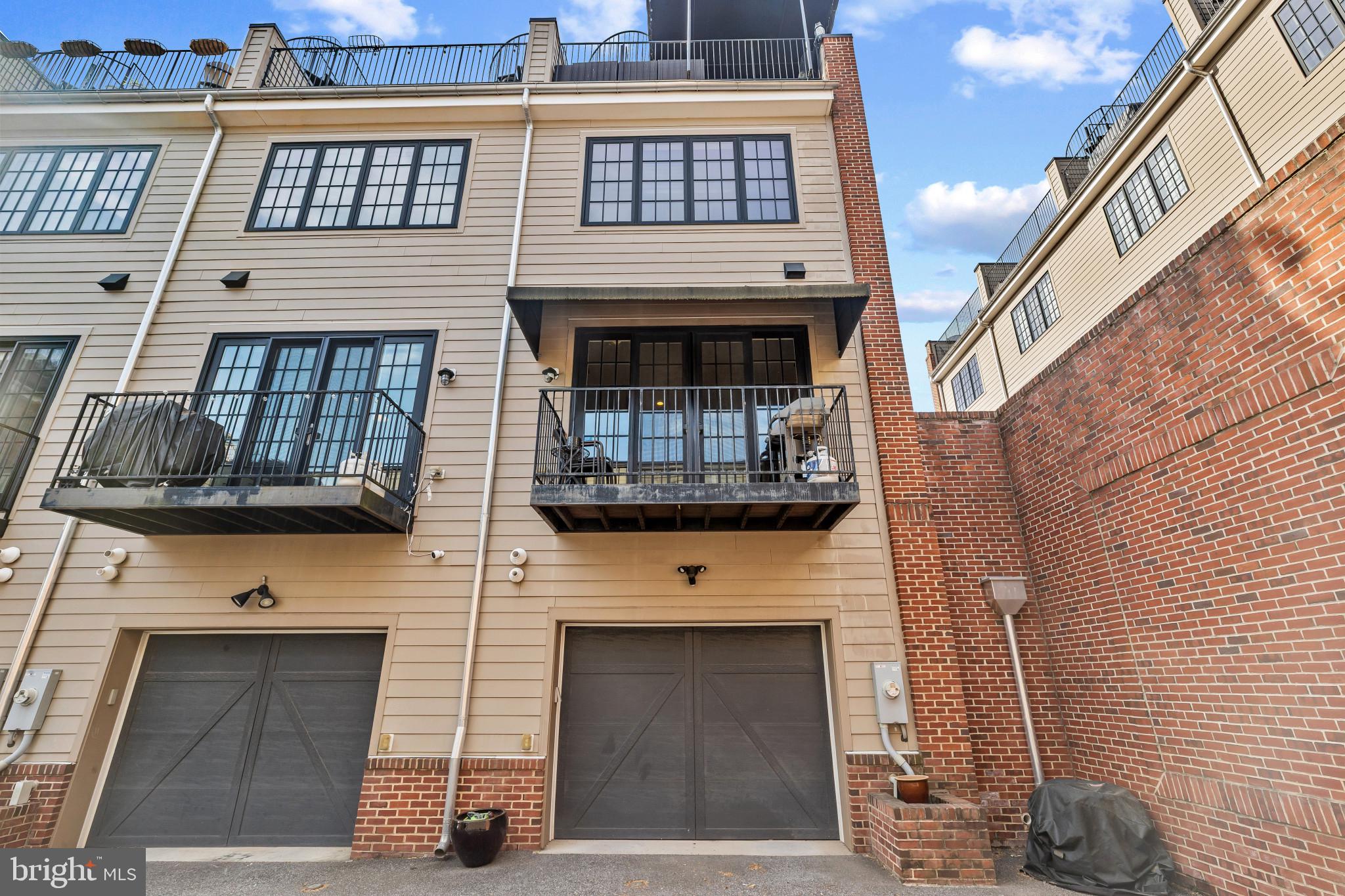 3800 Dillon Street Baltimore, MD 21224 - Photo 33 of 34 a front view of a house with a balcony