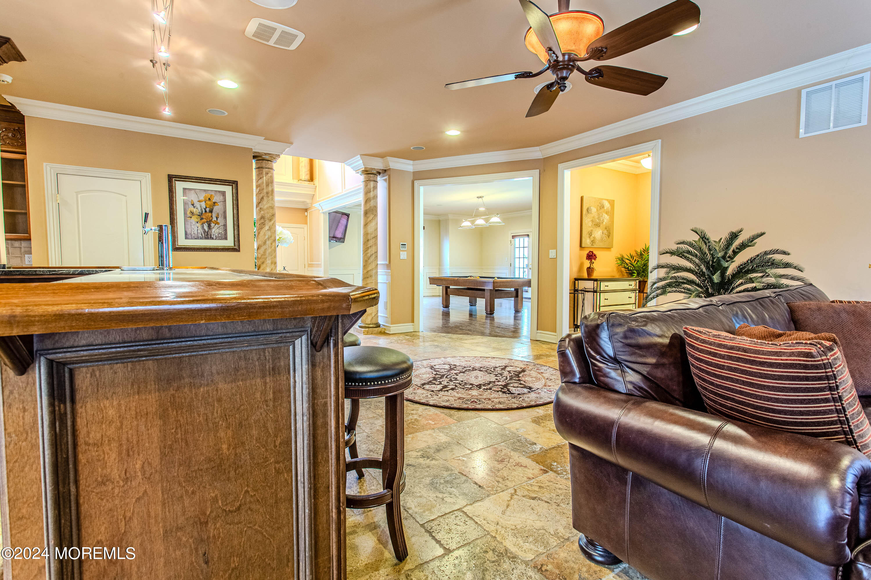 25 Woods End Road Colts Neck, NJ 07722 - Photo 13 of 76 a living room with furniture and a table