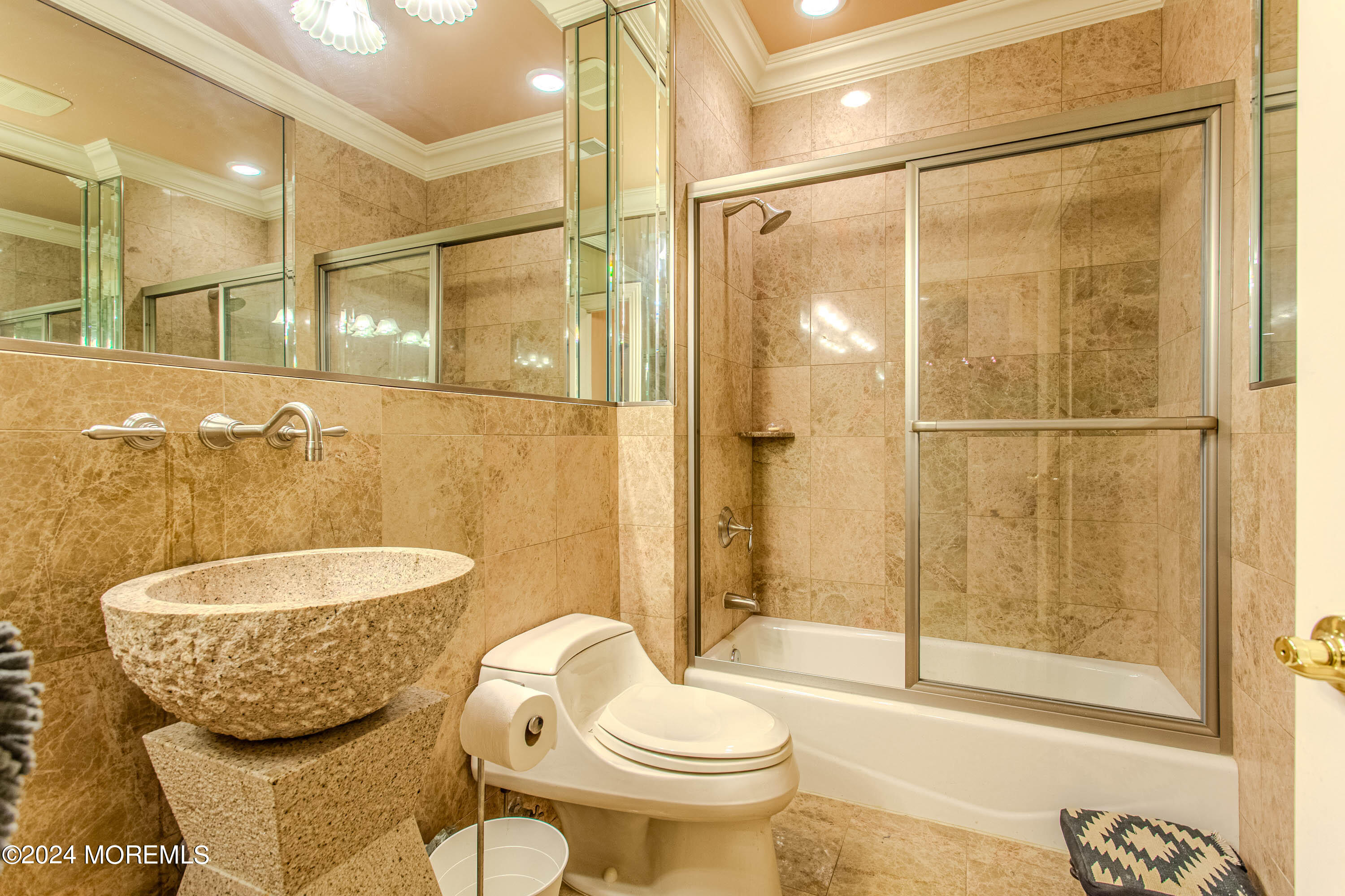 25 Woods End Road Colts Neck, NJ 07722 - Photo 15 of 76 a bathroom with a granite countertop toilet sink and shower