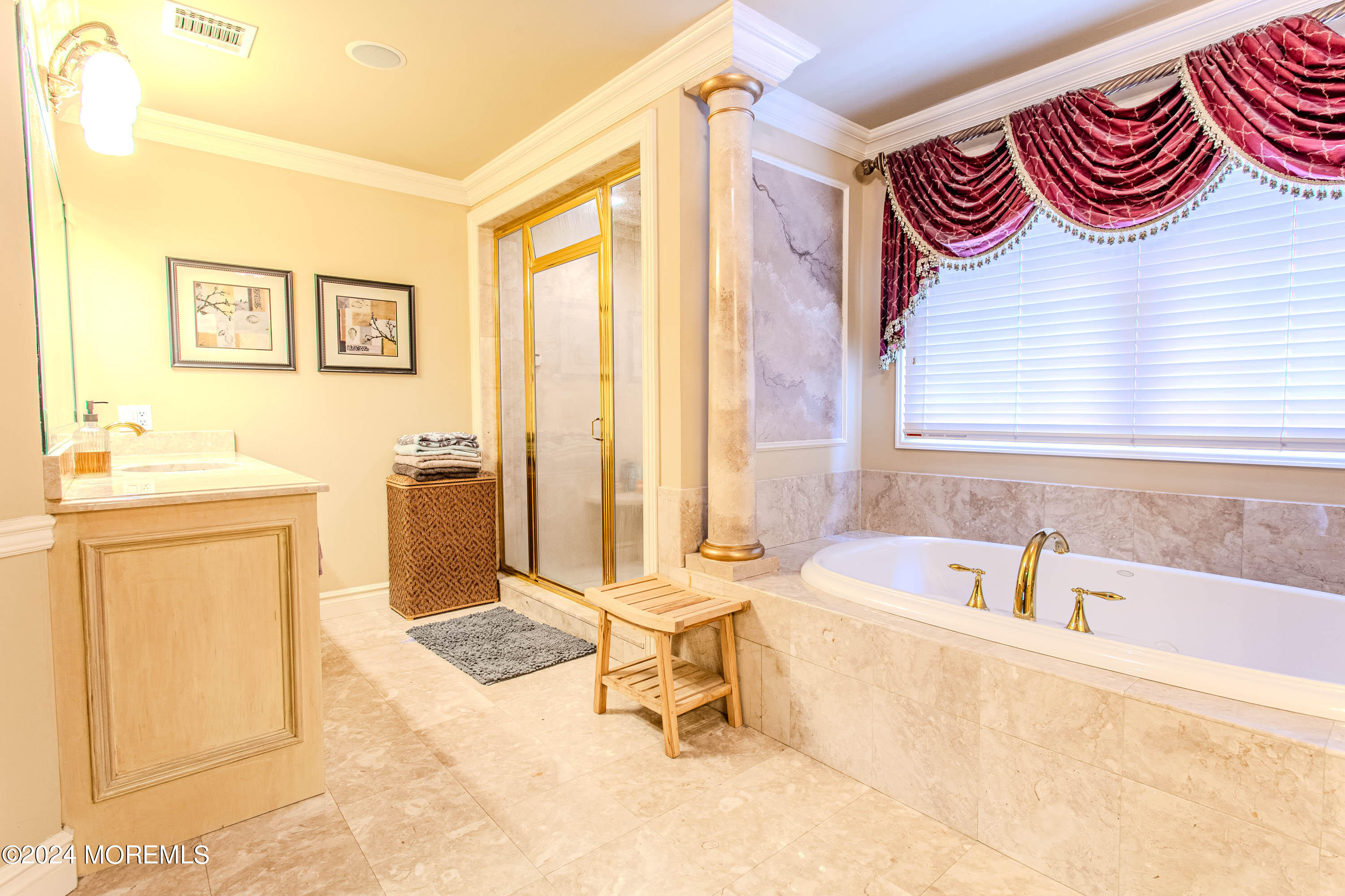 25 Woods End Road Colts Neck, NJ 07722 - Photo 41 of 76 a bathroom with a sink a bathtub and a shower