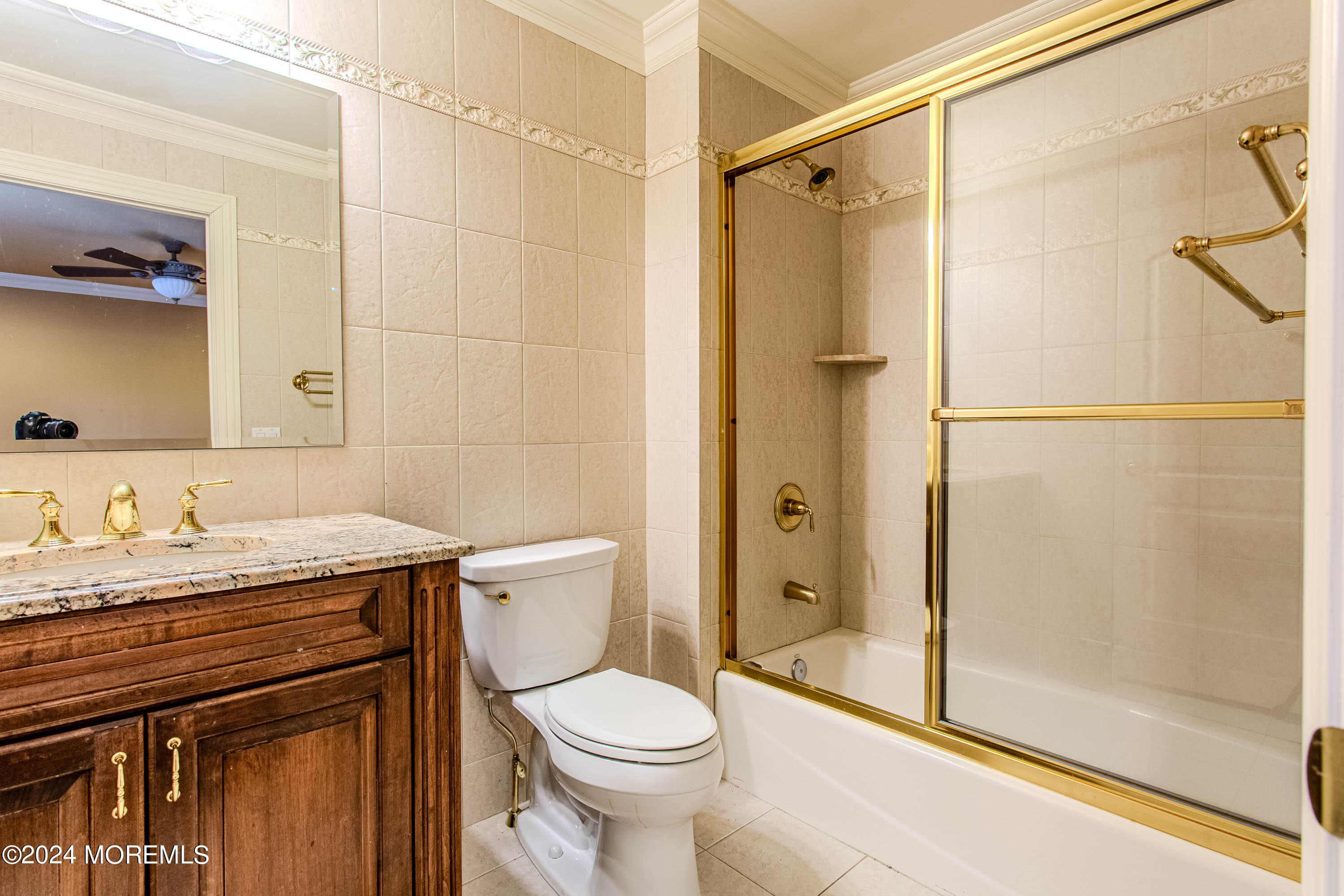 25 Woods End Road Colts Neck, NJ 07722 - Photo 47 of 76 a bathroom with a granite countertop sink toilet and shower