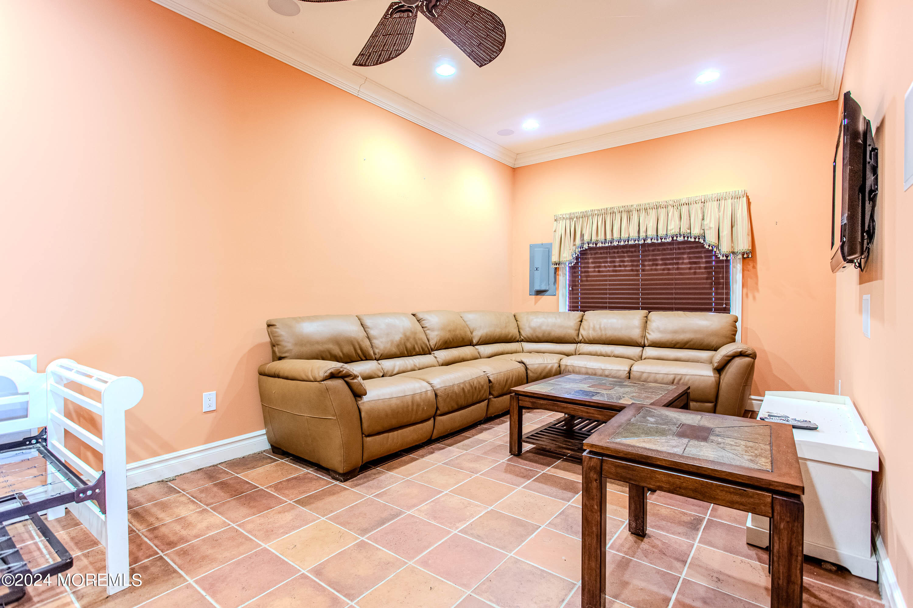 25 Woods End Road Colts Neck, NJ 07722 - Photo 67 of 76 a living room with furniture and a rug