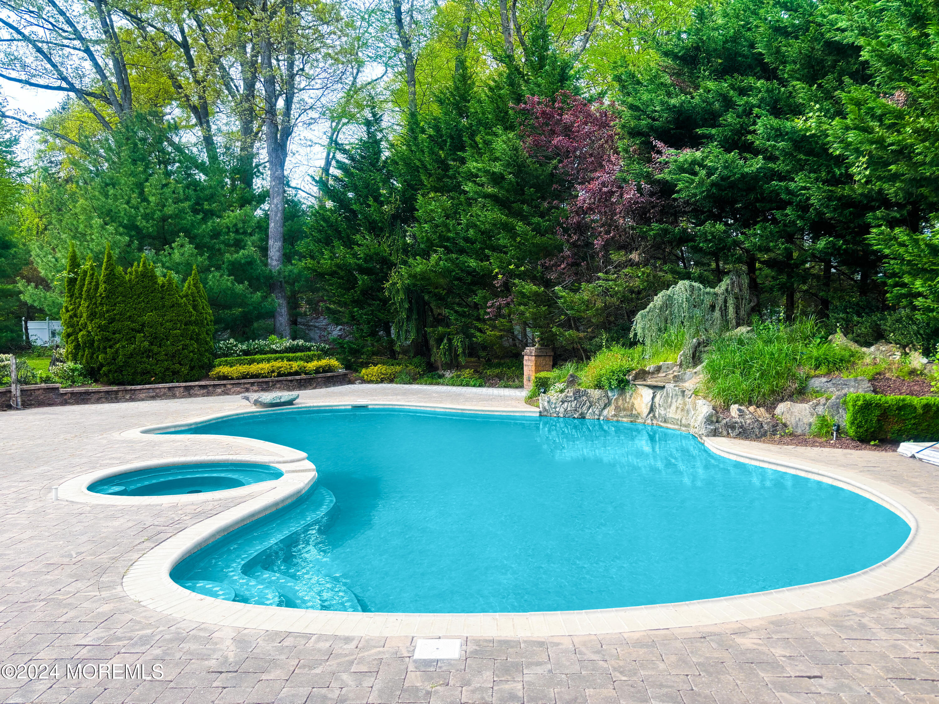 25 Woods End Road Colts Neck, NJ 07722 - Photo 69 of 76 a view of a swimming pool with a yard
