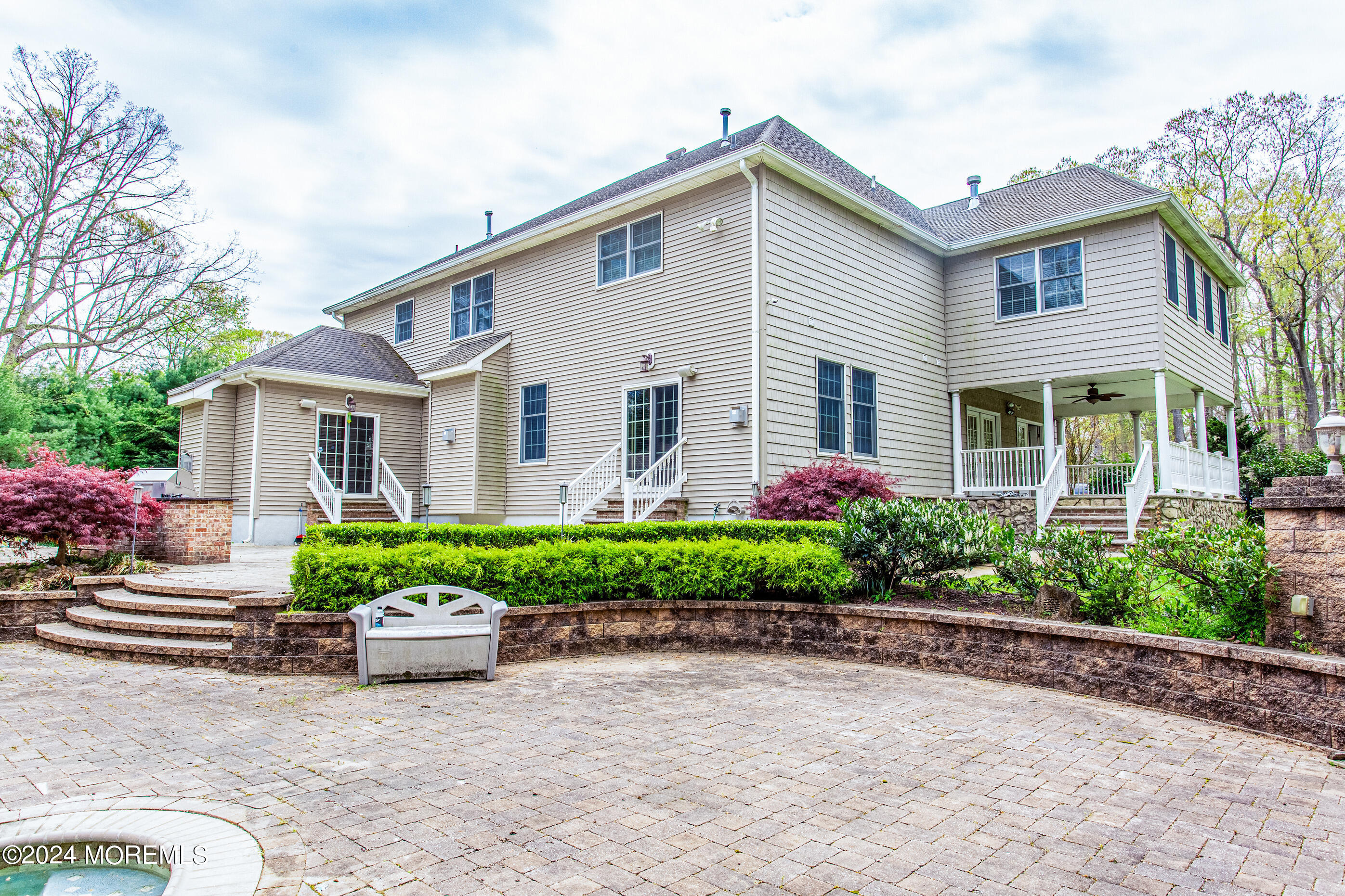 25 Woods End Road Colts Neck, NJ 07722 - Photo 73 of 76 a front view of house with yard and green space