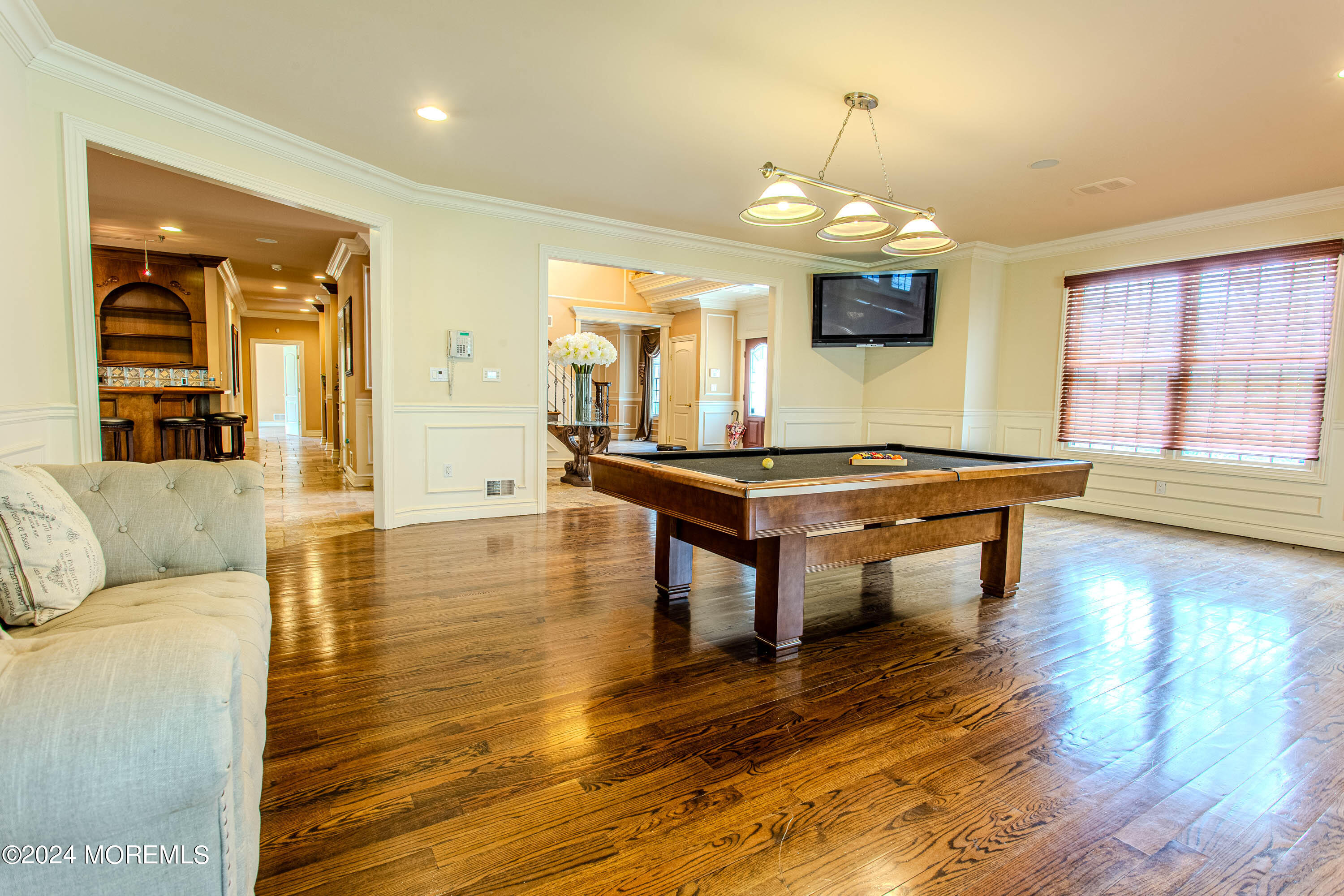 25 Woods End Road Colts Neck, NJ 07722 - Photo 9 of 76 a living room with furniture and wooden floor