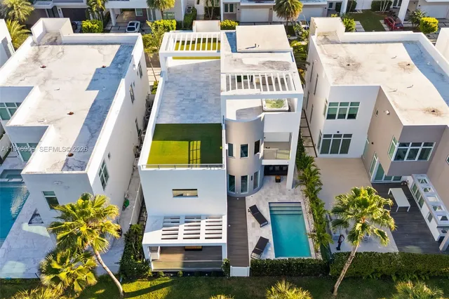 a view of swimming pool with outdoor seating