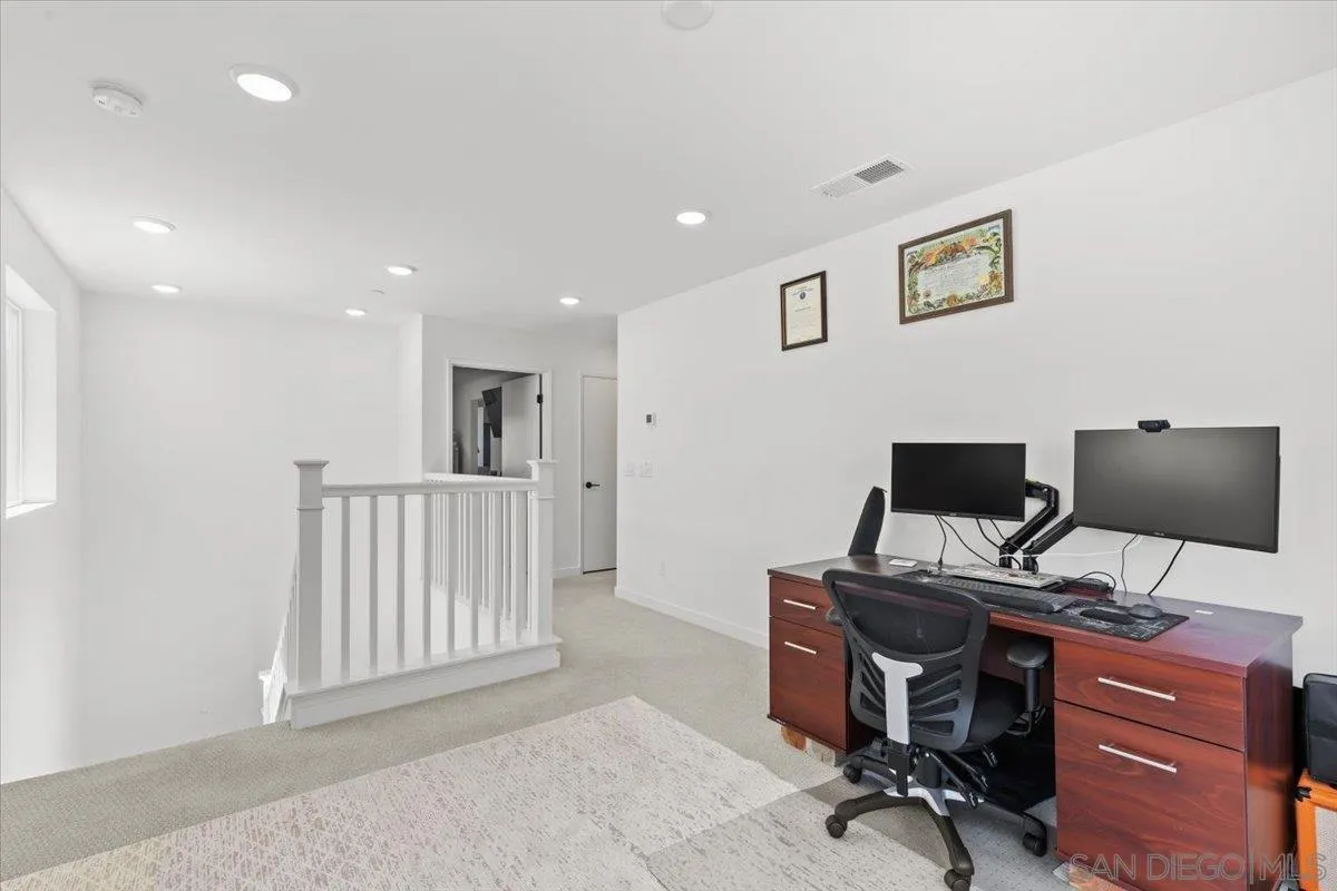 108 Lipizzan Lane Fallbrook, CA 92028 - Photo 16 of 37 a view of a workspace with furniture and a window