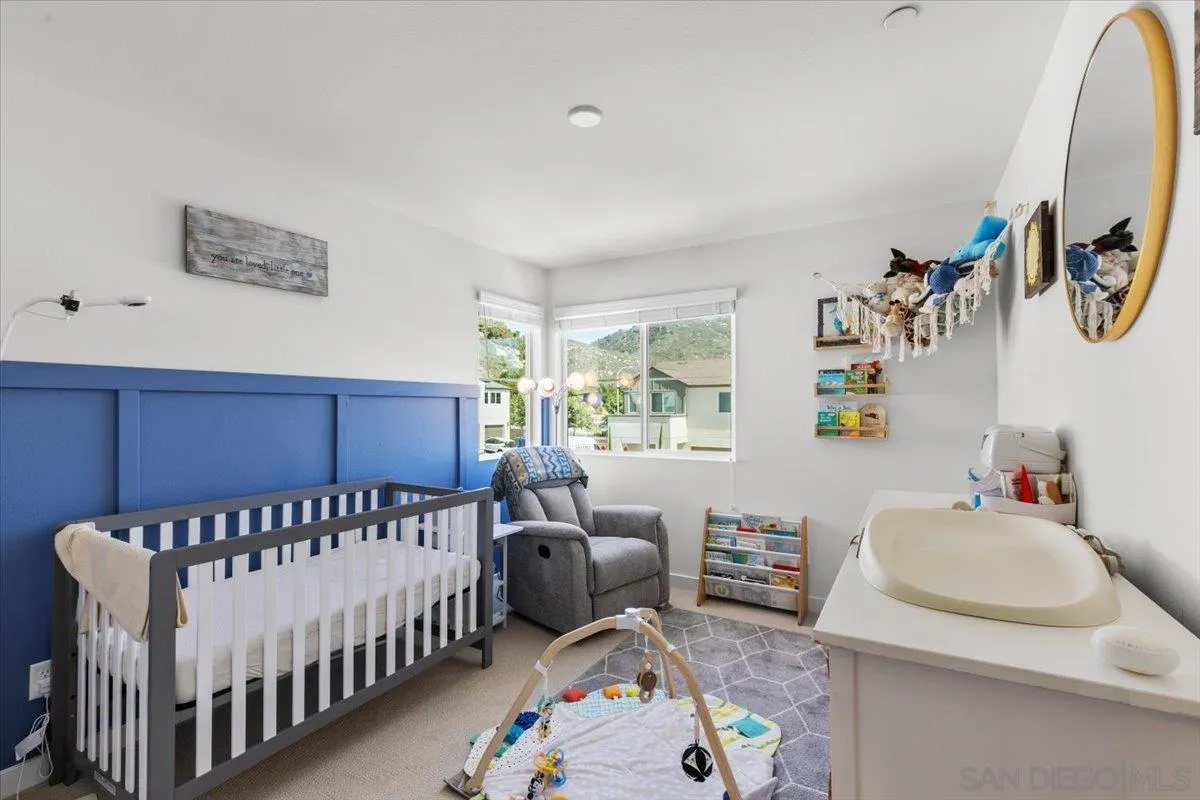 108 Lipizzan Lane Fallbrook, CA 92028 - Photo 22 of 37 a bedroom with furniture and a wooden floor