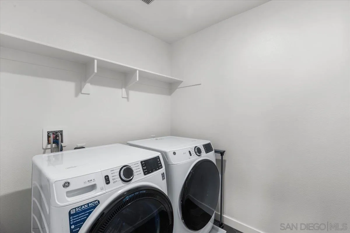 108 Lipizzan Lane Fallbrook, CA 92028 - Photo 23 of 37 a utility room with dryer and washer