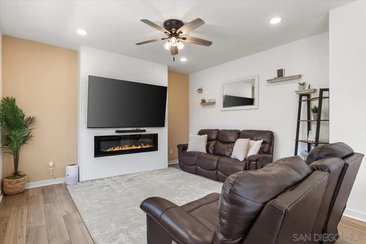 108 Lipizzan Lane Fallbrook, CA 92028 - Photo 7 of 37 a living room with furniture and a flat screen tv