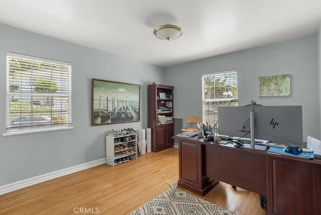 a workspace with furniture and window