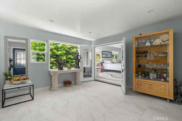 a room with furniture and a window