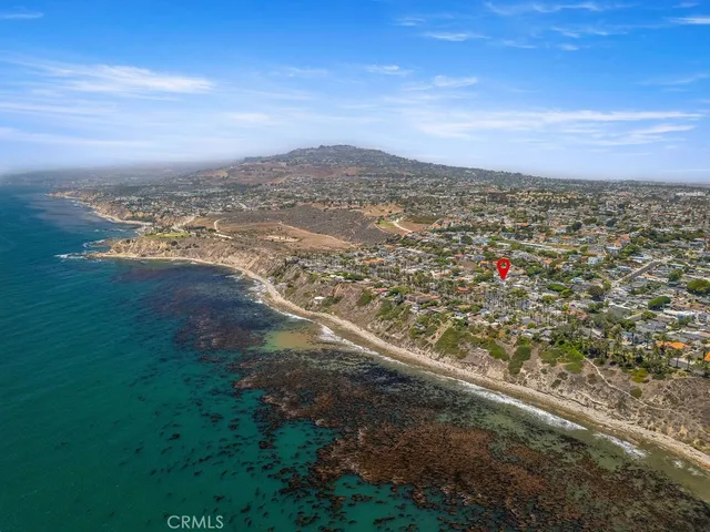 a view of city with ocean