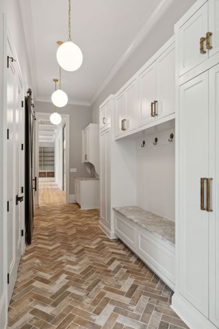 a spacious bathroom with a tub sink and mirror