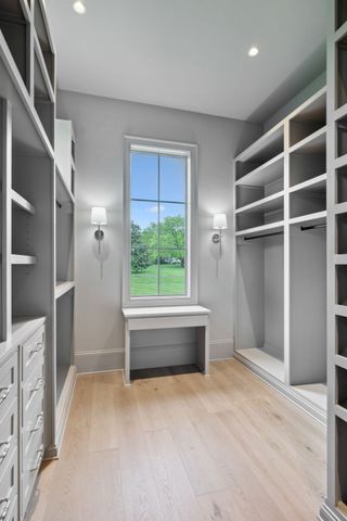 a view of two mirror and a sink