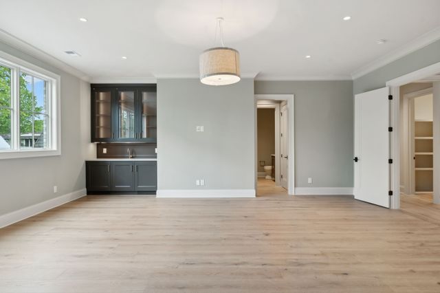 a bathroom with a sink and a shower