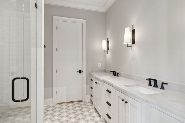 a view of a porch with furniture and garden