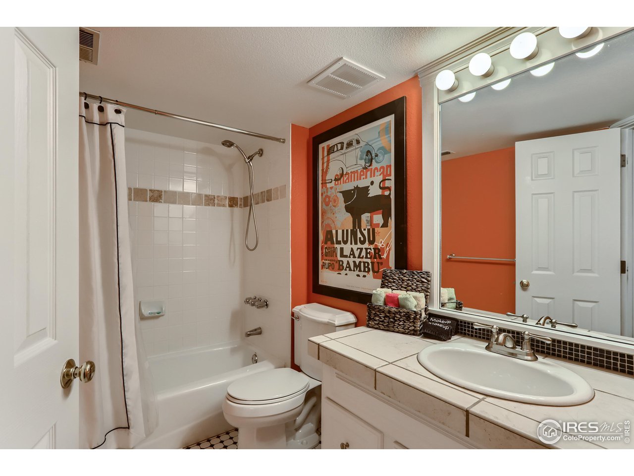 1109 Mapleton Avenue Boulder, CO 80304 - Photo 19 of 27 a bathroom with a sink toilet tub and shower