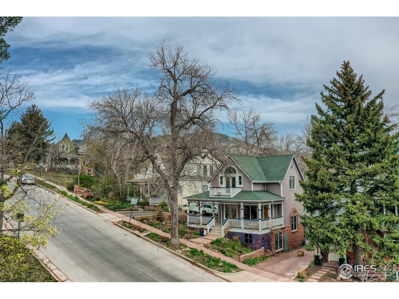 1109 Mapleton Avenue Boulder, CO 80304 - Photo 23 of 27 a view of house with outdoor space and sitting area