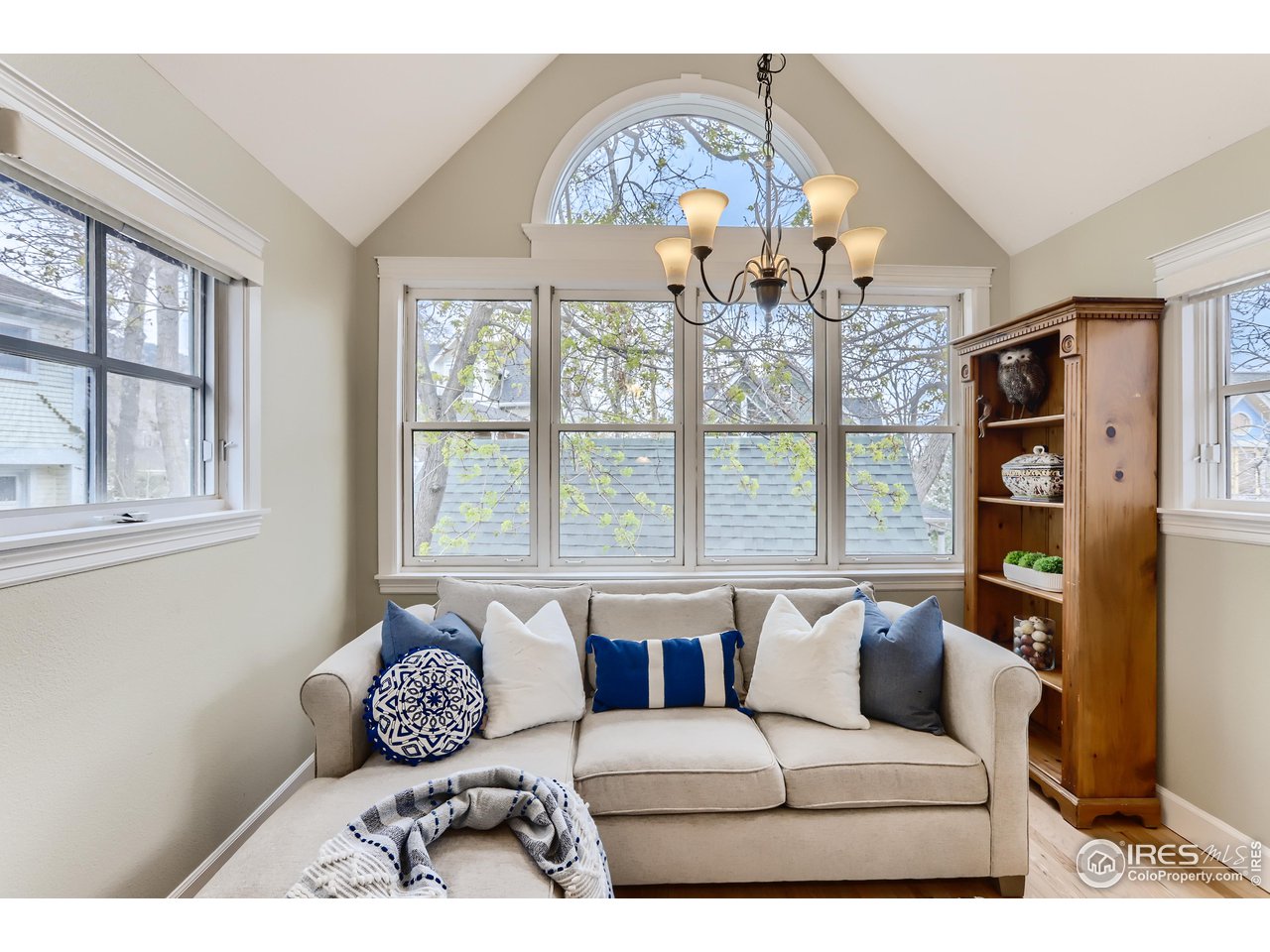 1109 Mapleton Avenue Boulder, CO 80304 - Photo 5 of 27 a living room with furniture and a large window