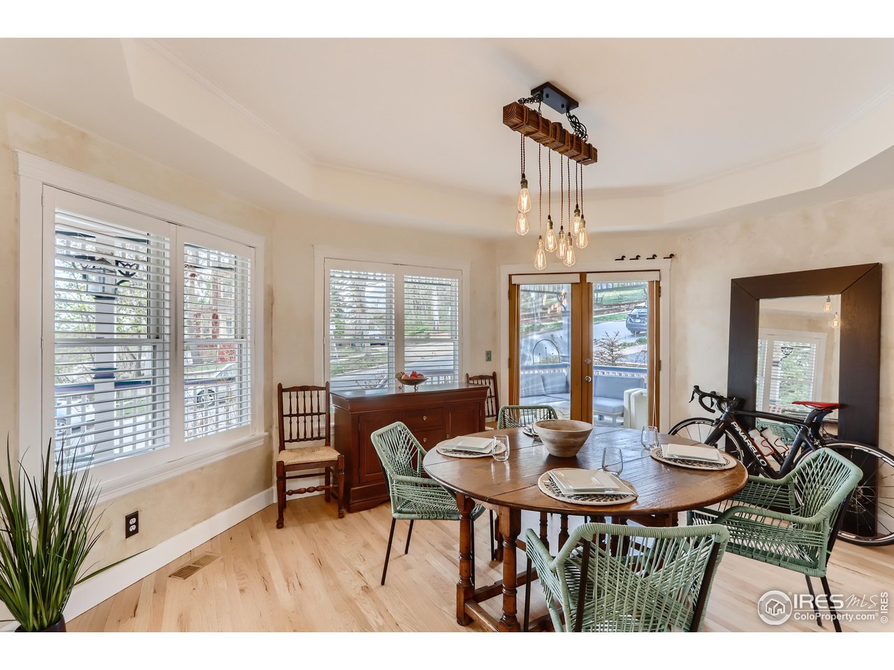 1109 Mapleton Avenue Boulder, CO 80304 - Photo 6 of 27 a view of a dining room with furniture window and outside view