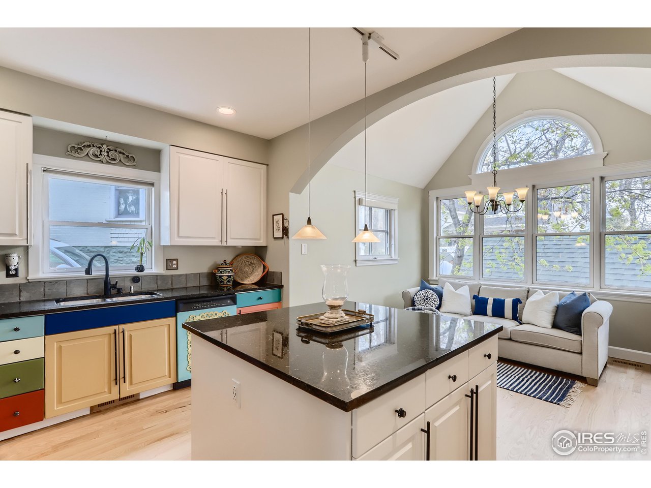 1109 Mapleton Avenue Boulder, CO 80304 - Photo 8 of 27 a kitchen with granite countertop a sink and cabinets