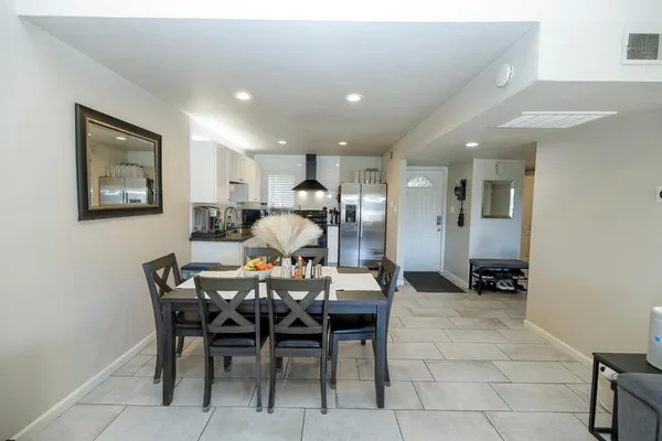 a view of a dining room with furniture