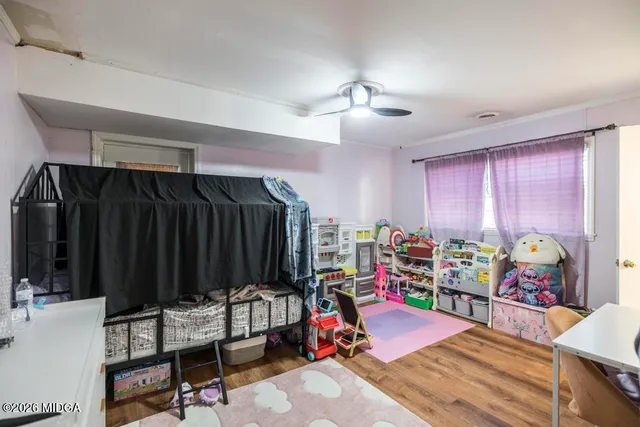 a bedroom with furniture and a bed