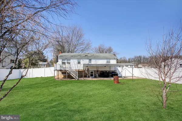 a view of a building with a big yard
