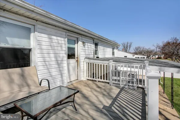 a view of yard with tree in the background
