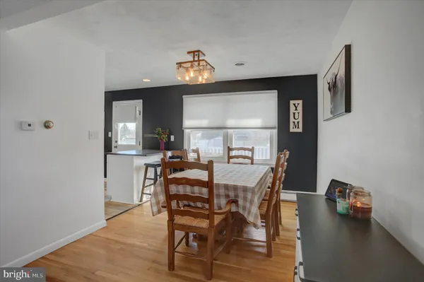 a view of a dining room with furniture