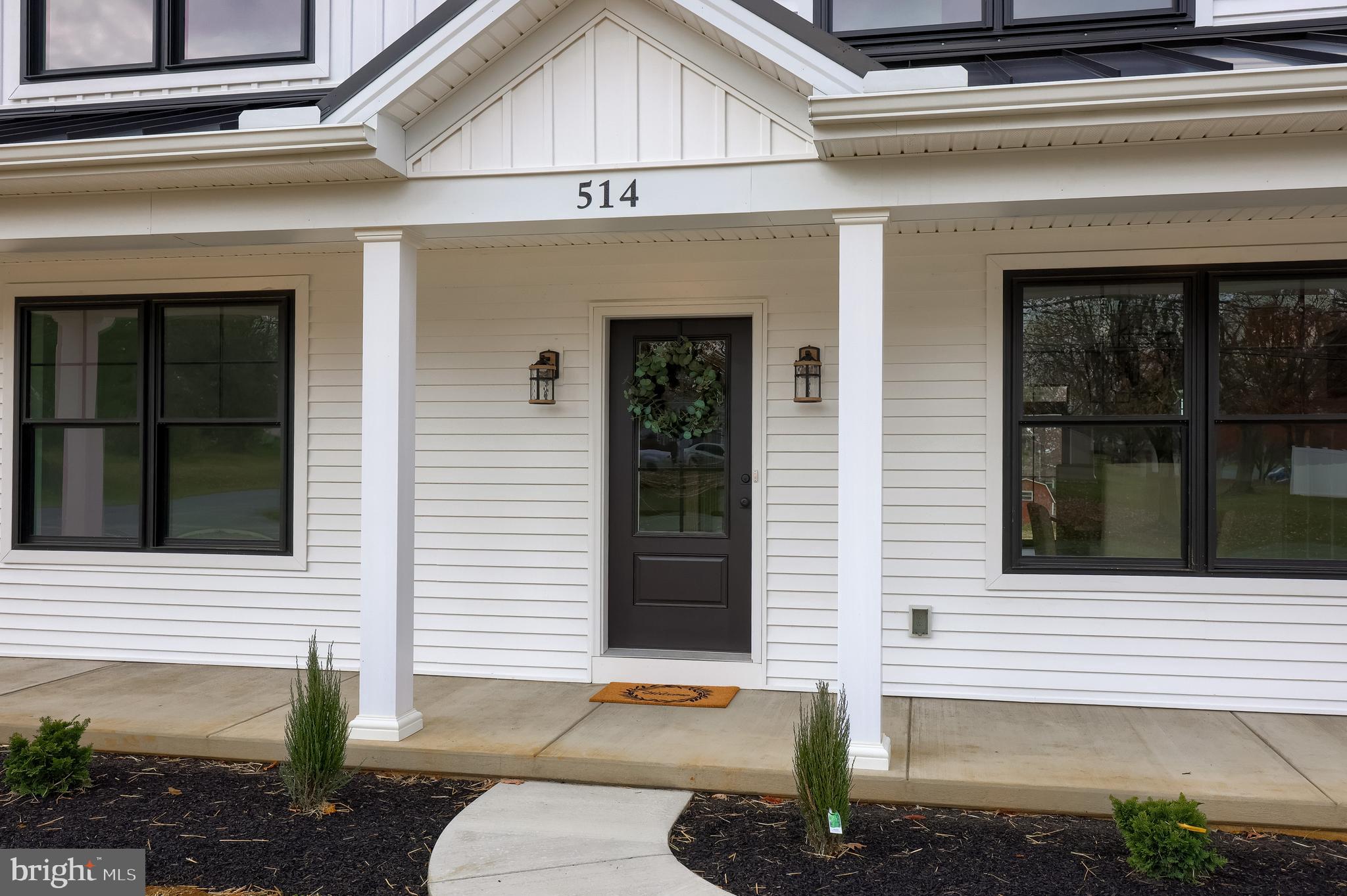 514 Woodcrest Avenue Lititz, PA 17543 - Photo 2 of 64 a front view of a house with a garage