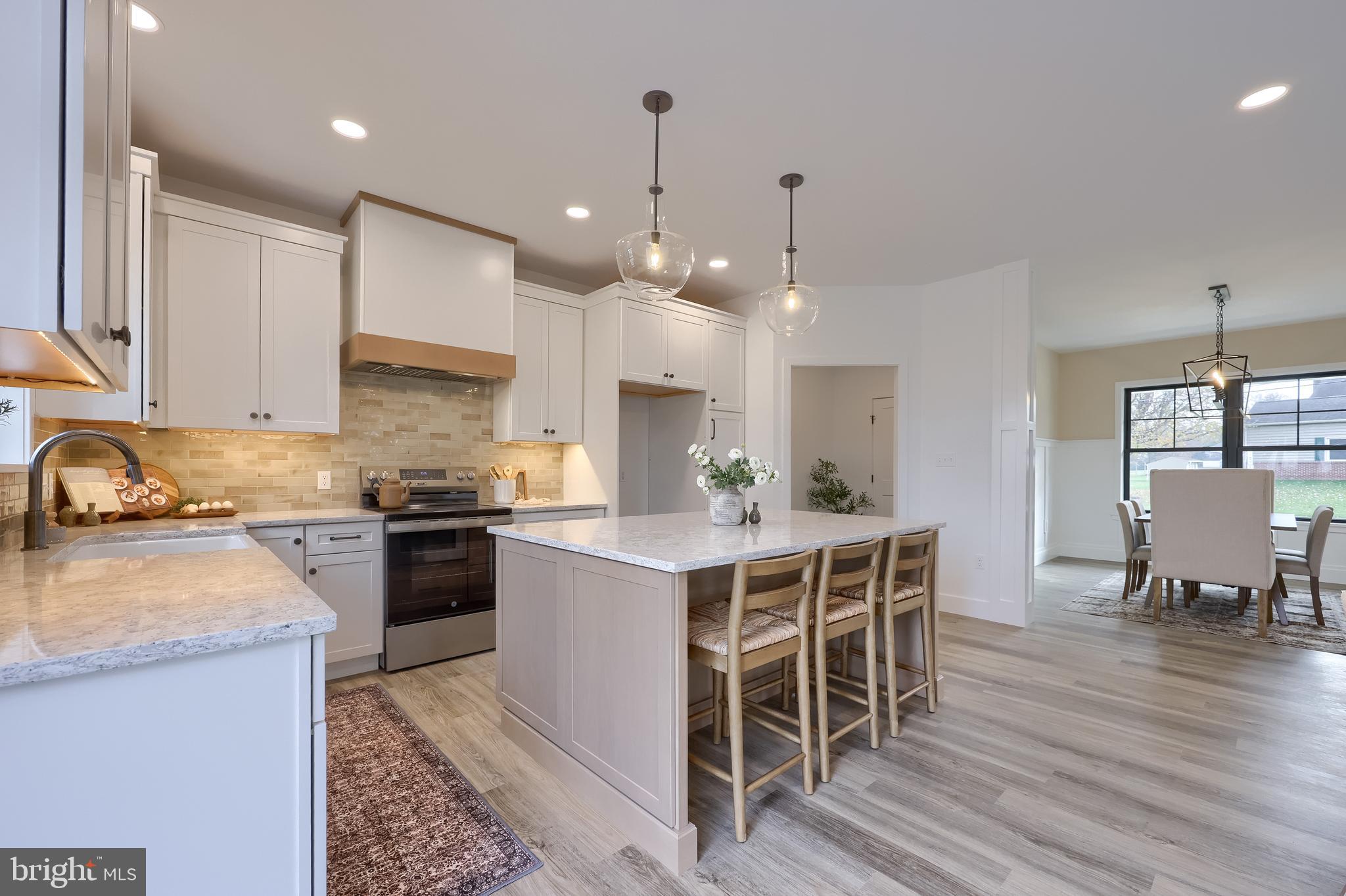 514 Woodcrest Avenue Lititz, PA 17543 - Photo 24 of 64 a kitchen with a table and chairs in it