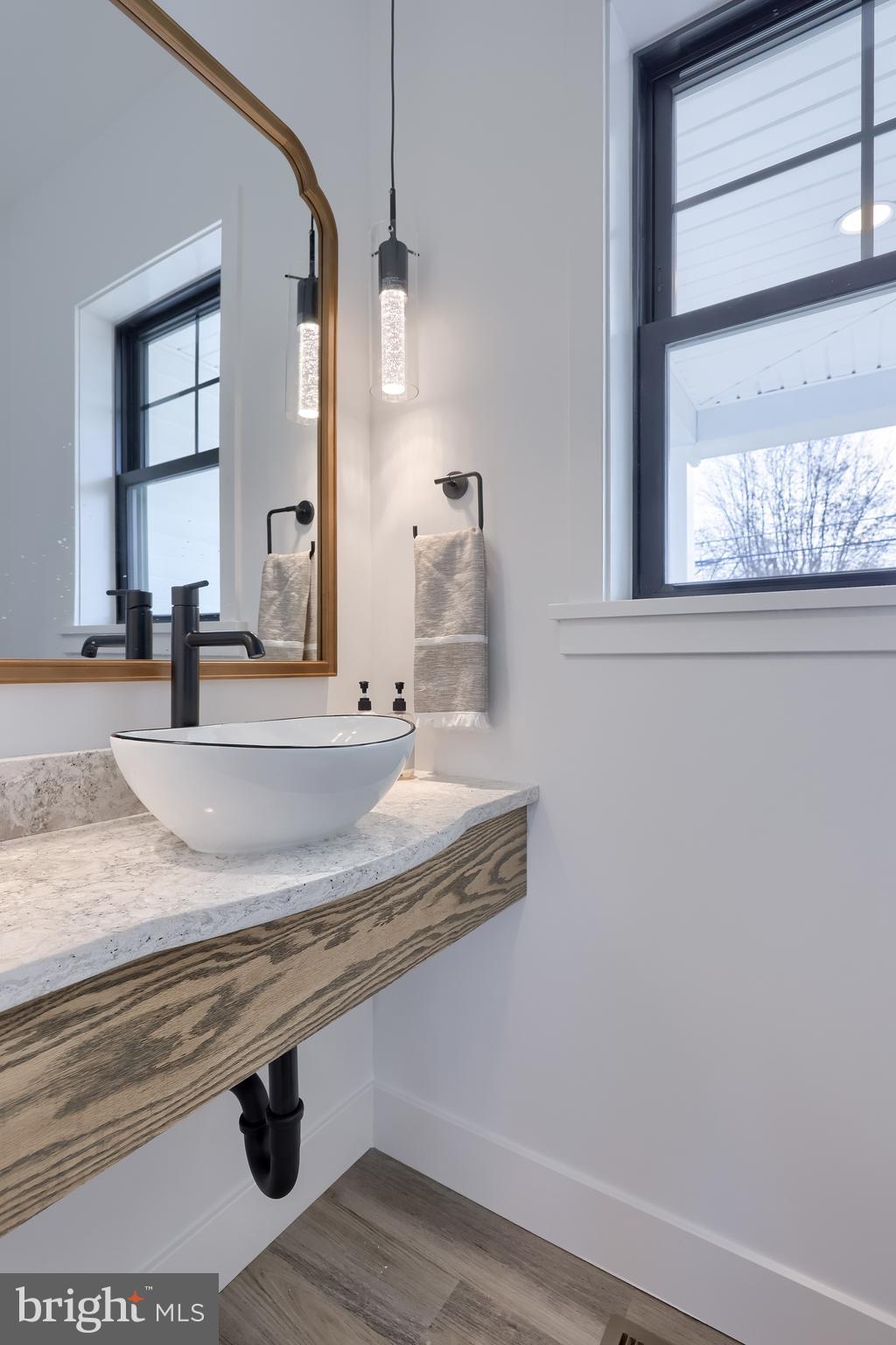 514 Woodcrest Avenue Lititz, PA 17543 - Photo 29 of 64 a bathroom with a sink and a mirror