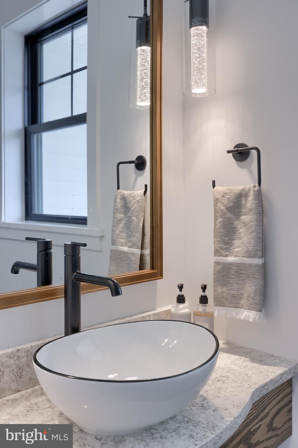 514 Woodcrest Avenue Lititz, PA 17543 - Photo 30 of 64 a bathroom with a sink and a mirror