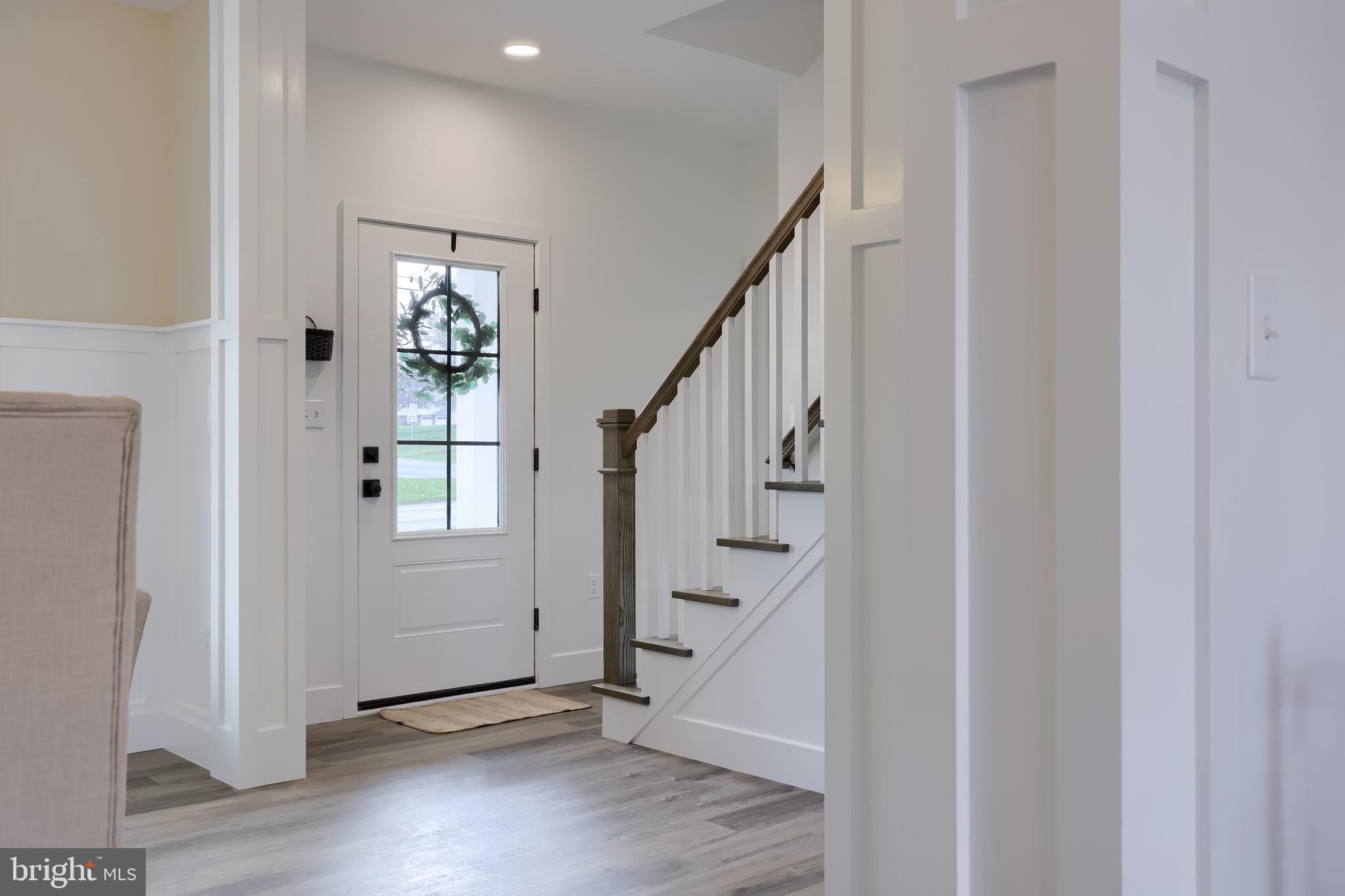 514 Woodcrest Avenue Lititz, PA 17543 - Photo 35 of 64 a view of entryway with stairs and wooden floor